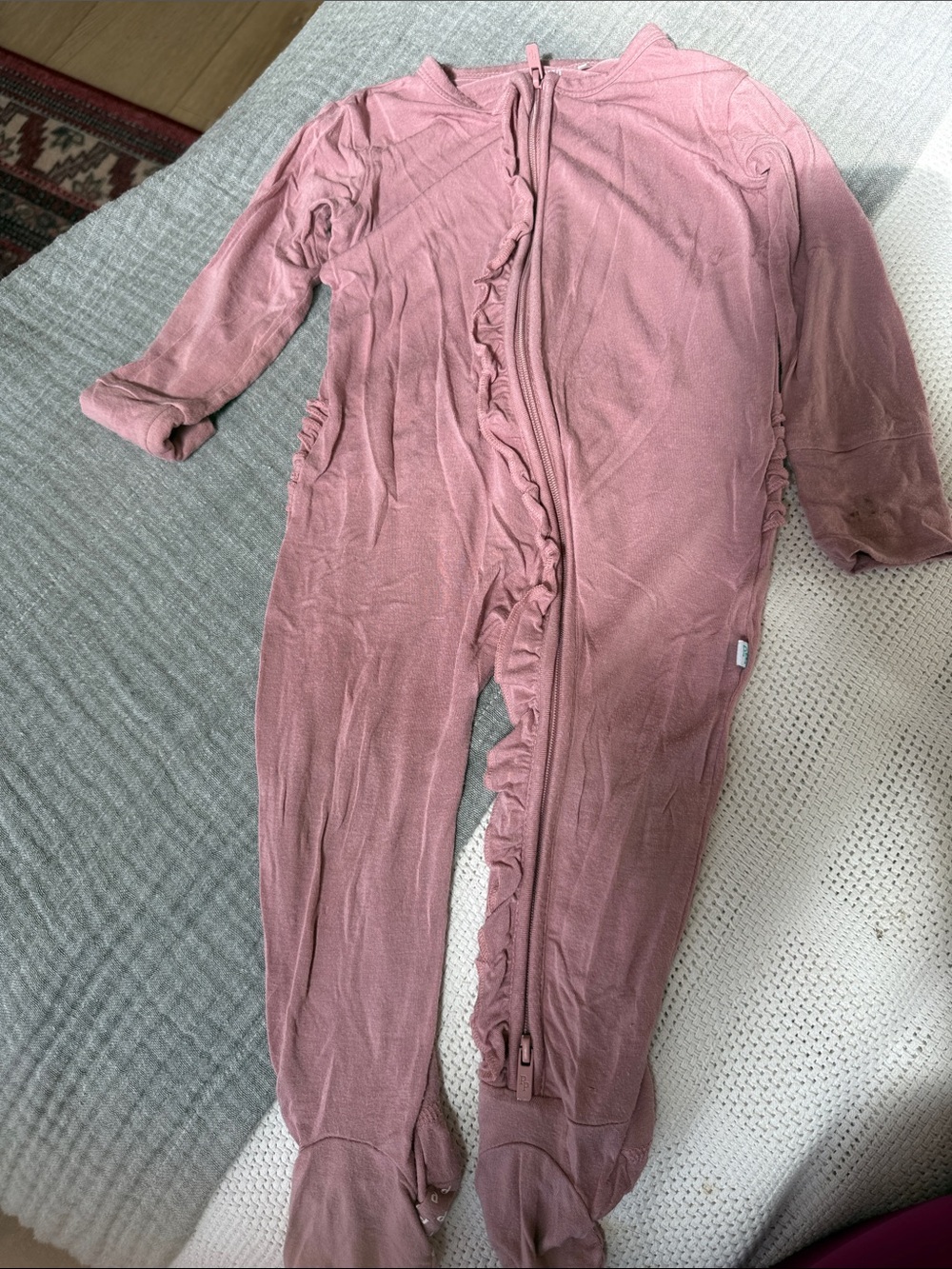 Posh Peanut Mauve Ruffle Zip Footed One-Piece
